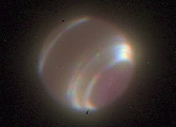 APOD: Neptune through Adaptive Optics - February 18, 2000