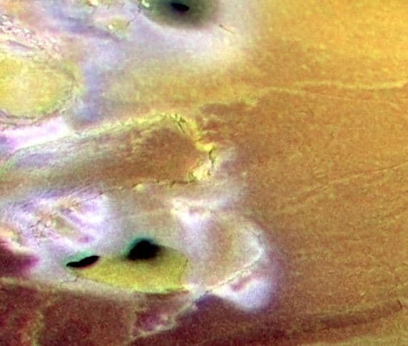 NASA APOD April 27, 2000: Calderas And Cliffs Near Io's South Pole