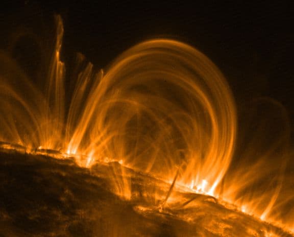 APOD: Heating Coronal Loops - September 28, 2000