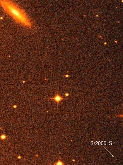 APOD: New Moons For Saturn - November 3, 2000