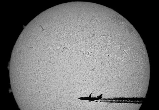 APOD: An Airplane in Front of the Sun - January 29, 2001