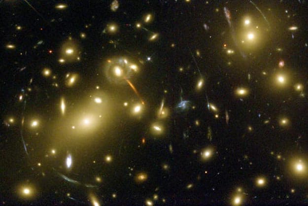 NASA APOD October 7, 2001: Abell 2218: A Galaxy Cluster Lens