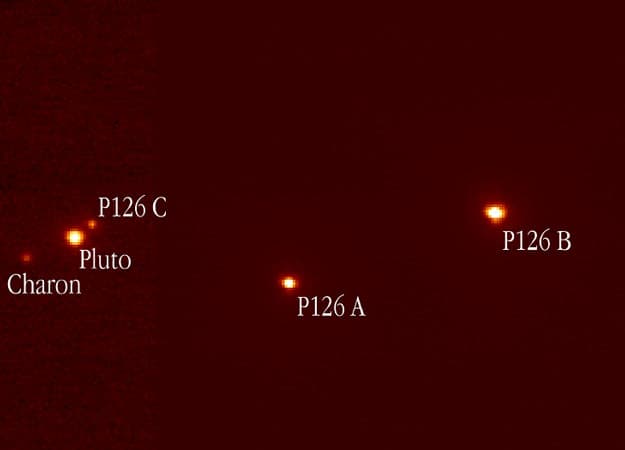 APOD: Pluto & Charon Eclipse a Triple Star - September 11, 2002