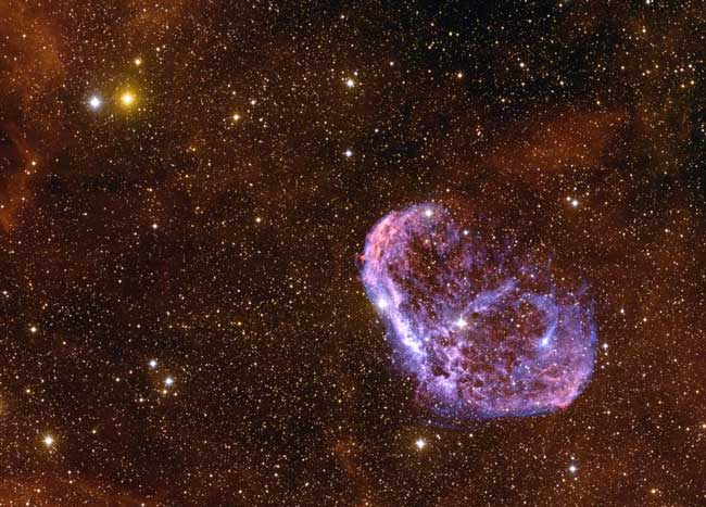 APOD: A Crescent Nebula Star Field - April 15, 2003