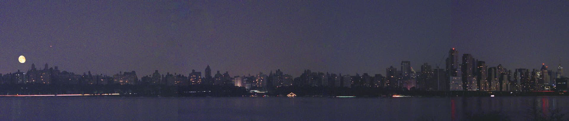 APOD: Bright Lights, Dark City - August 18, 2003