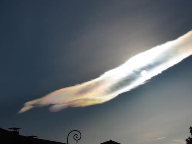 APOD: An Iridescent Cloud Over France - April 13, 2004
