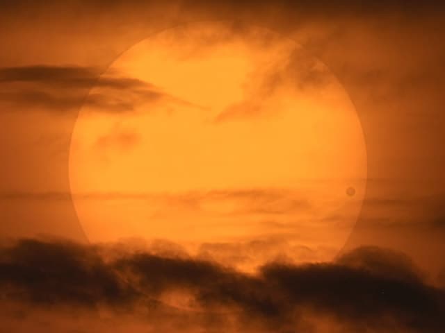APOD: A Picturesque Venus Transit - June 23, 2004