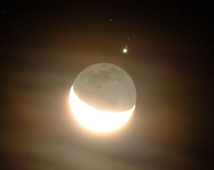 APOD: Jupiter and the Moon's Shadowed Horizon - December 9, 2004