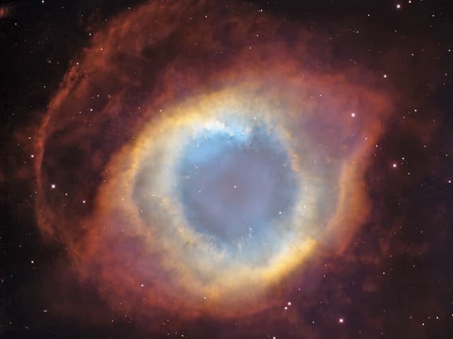 APOD: The Helix Nebula from Blanco and Hubble - December 29, 2004