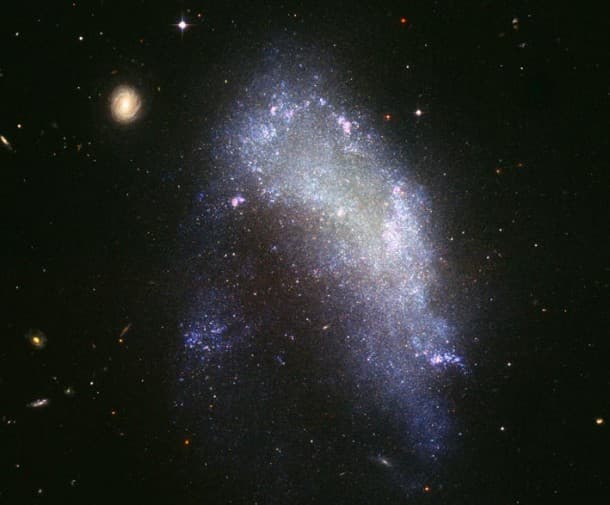 APOD: NGC 1427A: Galaxy in Motion - March 4, 2005