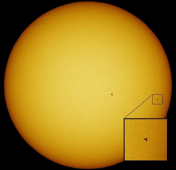 APOD: ISS and Discovery Transit the Sun - July 29, 2005