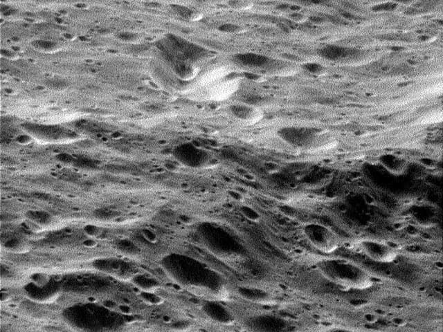 APOD: 620 Kilometers Above Rhea - December 13, 2005