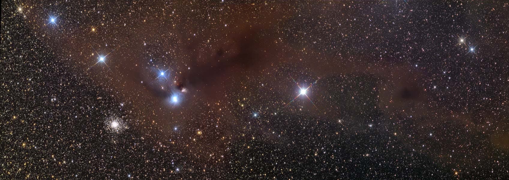 APOD: Stars and Dust Across Corona Australis - April 3, 2006