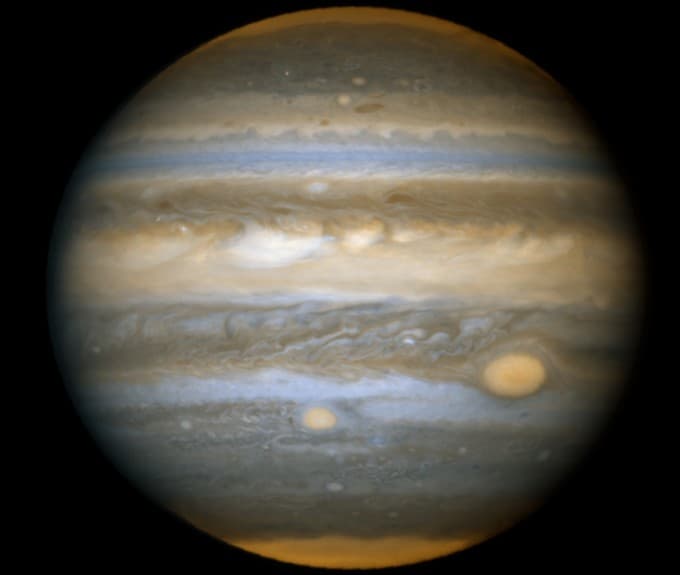 APOD: Jupiter and the Red Spots - May 5, 2006
