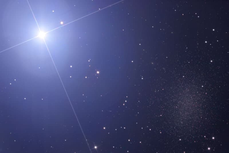 APOD: Bright Star Regulus near the Leo 1 Dwarf Galaxy - June 19, 2006