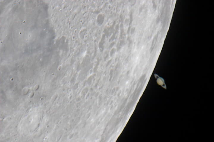 NASA APOD May 26, 2007: The Moon's Saturn