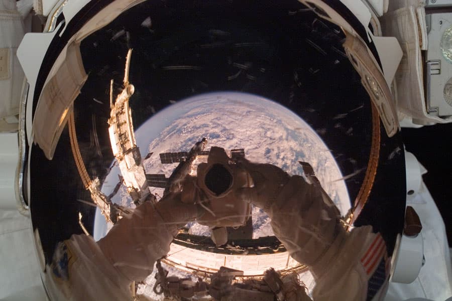 NASA APOD January 23, 2008: Orbiting Astronaut Reflects Earth