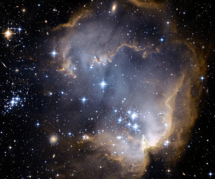 APOD: NGC 602 and Beyond - October 25, 2008