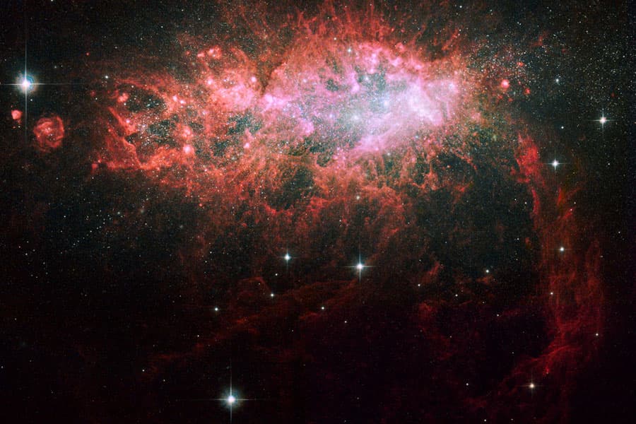 APOD: NGC 1569: Starburst in a Dwarf Irregular Galaxy - December 29, 2008