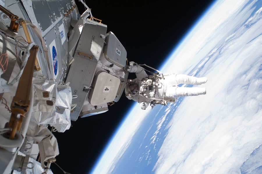APOD: Astronaut Installs Panoramic Space Window - February 24, 2010