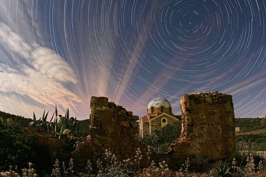 APOD: Illuminated Cloud Trails Above Greece - March 15, 2010