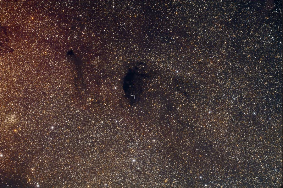APOD: Dim World, Dark Nebula - July 8, 2010