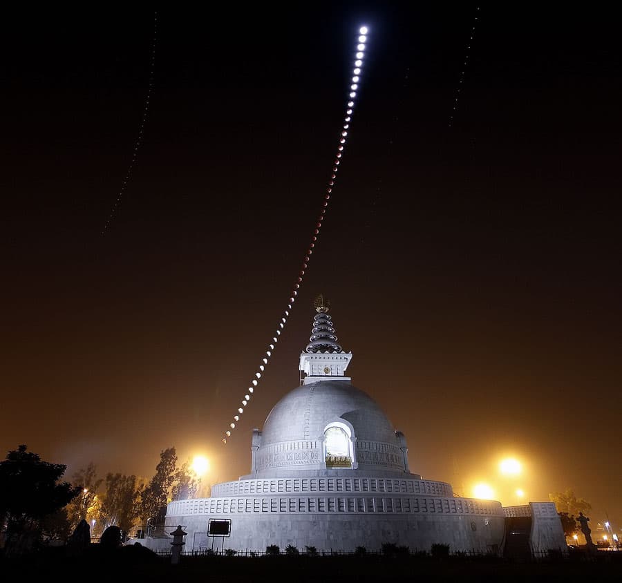 APOD: A Lunar Eclipse Over an Indian Peace Pagoda - December 14, 2011