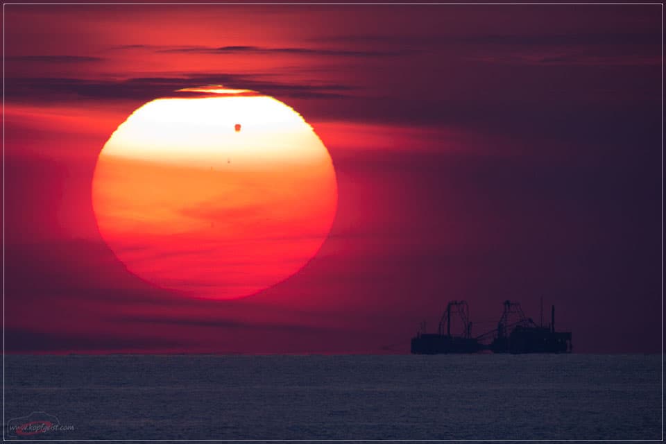 APOD: A Venus Transit Over the Baltic Sea - June 13, 2012