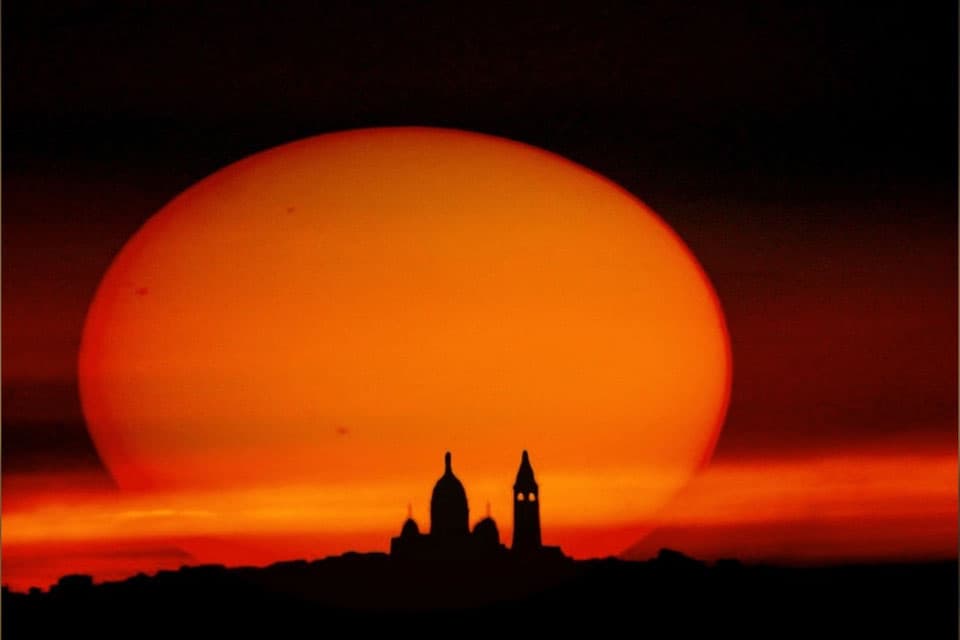 APOD: Sunspots and Silhouettes - July 4, 2012