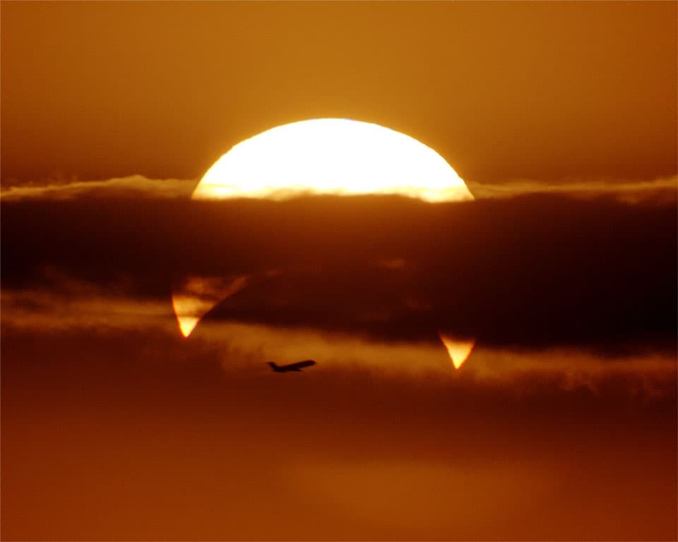 APOD: Partial Solar Eclipse with Airplane - May 13, 2013