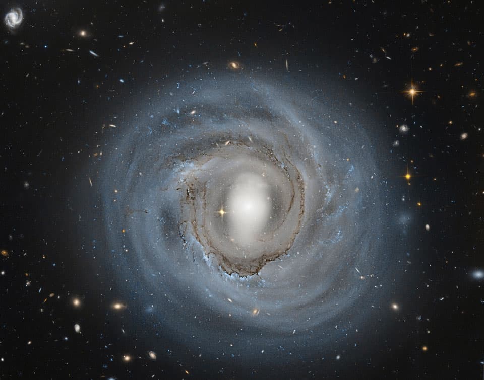 APOD: Anemic Spiral NGC 4921 from Hubble - November 25, 2013