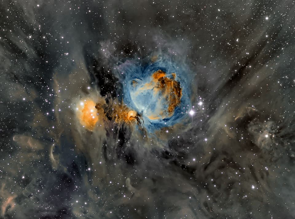 APOD: Orion Nebula in Surrounding Dust - March 25, 2014