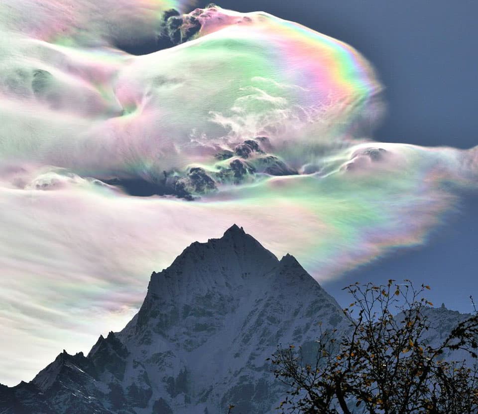 NASA APOD July 8, 2014: Iridescent Clouds over Thamserku