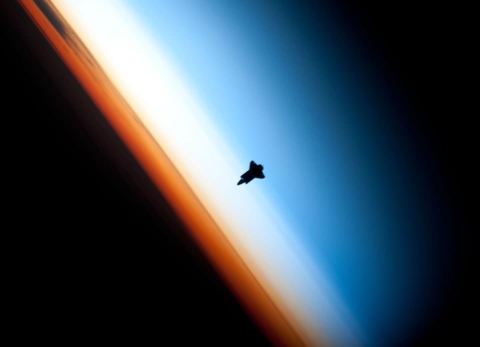NASA APOD August 3, 2014: Dark Shuttle Approaching