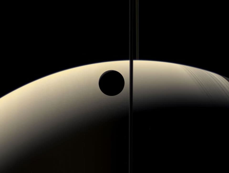 APOD: Crescent Rhea Occults Crescent Saturn - January 4, 2015