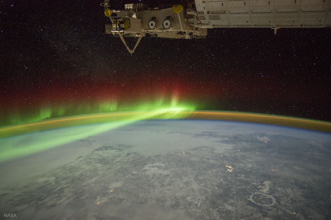 APOD: Aurora and Manicouagan Crater from the Space Station - May 29, 2018