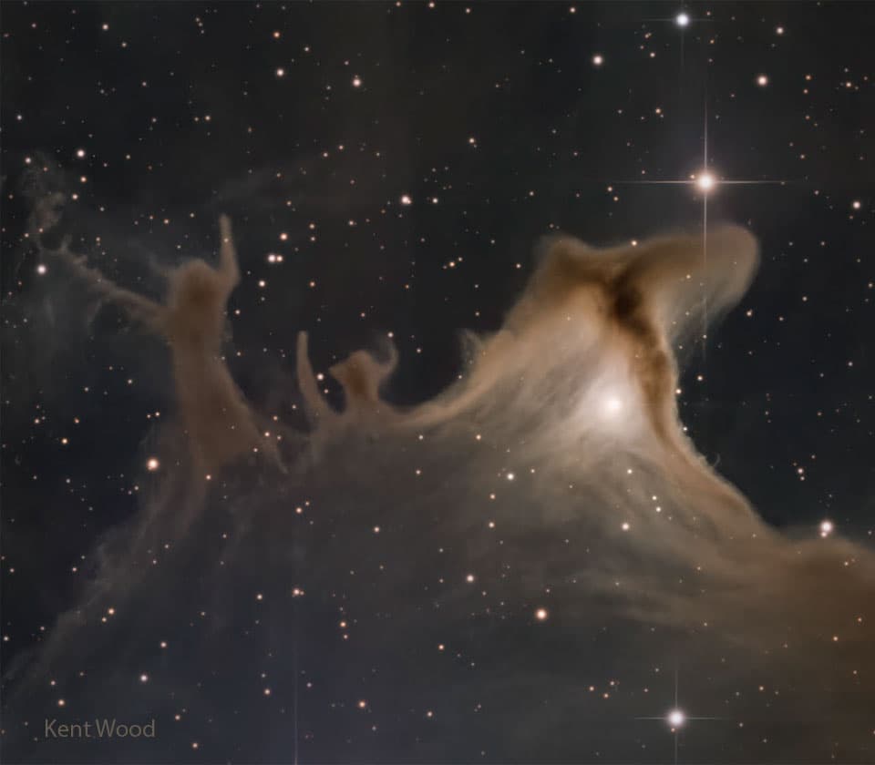 APOD: Dust Shapes of the Ghost Nebula - October 29, 2025