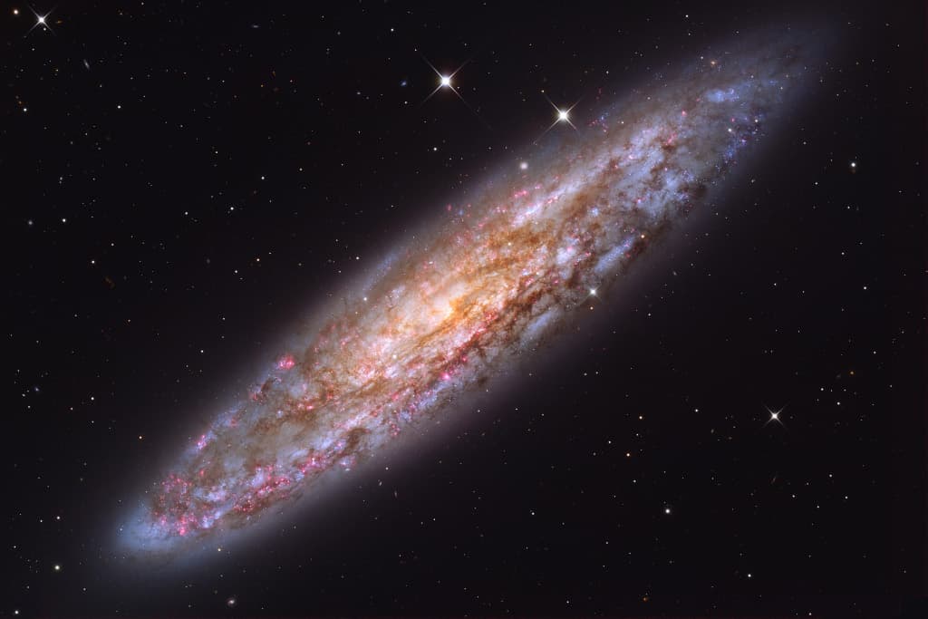 APOD: NGC 253: Dusty Island Universe - November 6, 2025