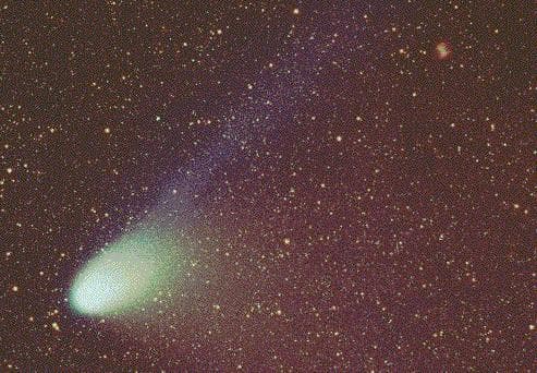 APOD: Comet Hale-Bopp and the Dumbbell Nebula
Credit and Copyright: - February 20, 1997