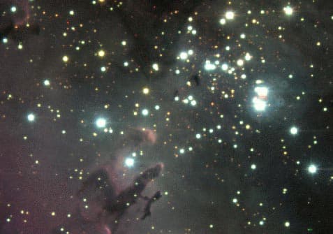 APOD: Blue Stars and Red Pillars - July 18, 1997