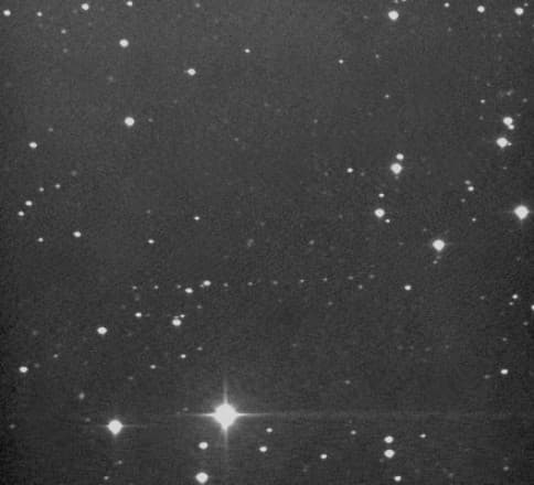 APOD: Cassini Flyby - August 26, 1999