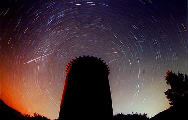 APOD: Leonids Above Torre de la Guaita - November 23, 1999