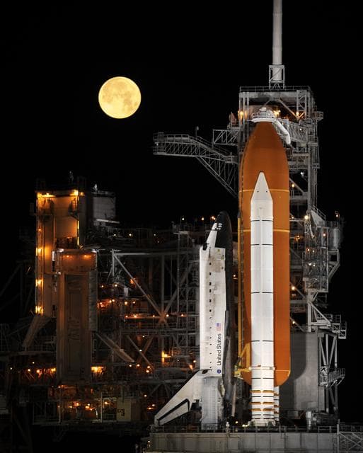 STS-119 Shuttle Discovery With Moon