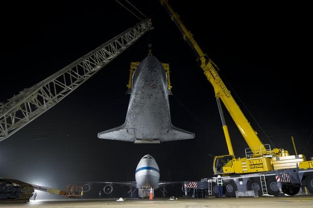 NASA image: Shuttle Discovery Is Demated From SCA