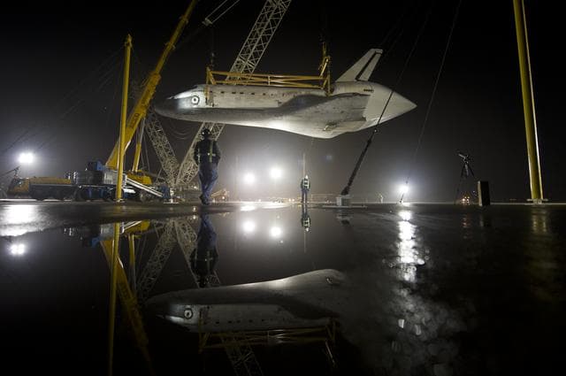 NASA image: Shuttle Discovery Is Demated From SCA
