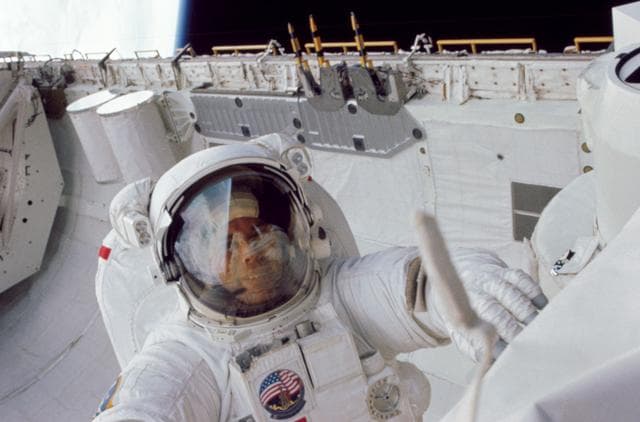 NASA image: Astronaut Leestma during an EVA in the aft cargo hold