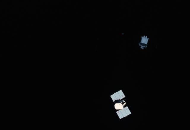 NASA image: View of Astronaut Nelson using MMU to examine Solar Maximum Mission Satellite