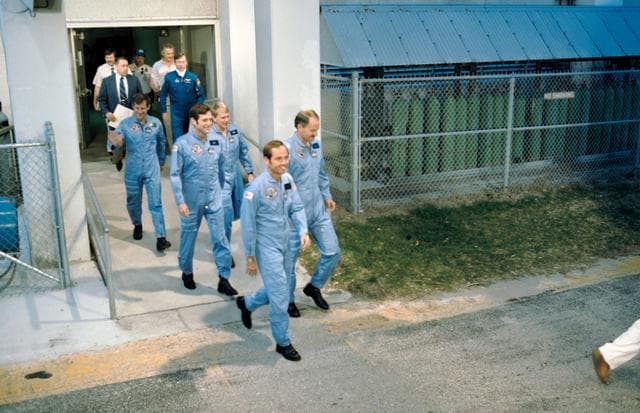 NASA image: STS 41-C crew move to transfer van for trip to Launch Pad 39B