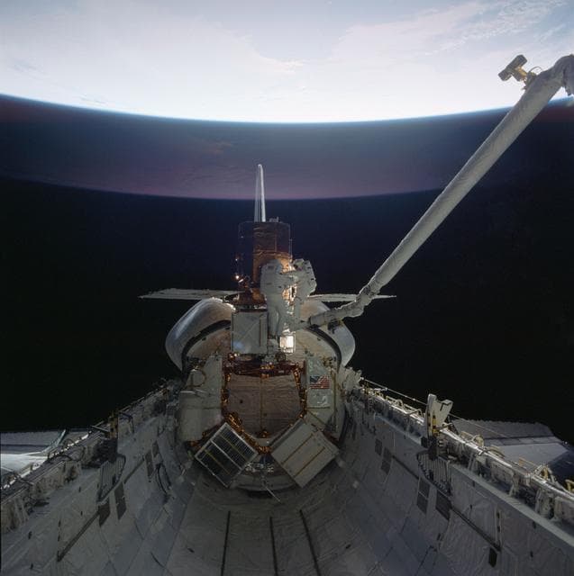 NASA image: 41-C mission specialists reapir captured Solar Maximum Mission Satellite