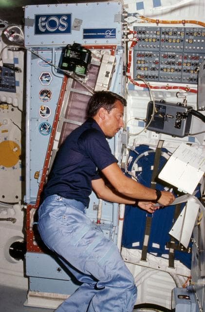 NASA image: Payload specialist Charles Walker works with CFES experiment